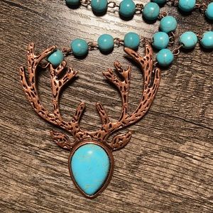 Turquoise/brass dear style necklace and dangle earrings that matches also brass